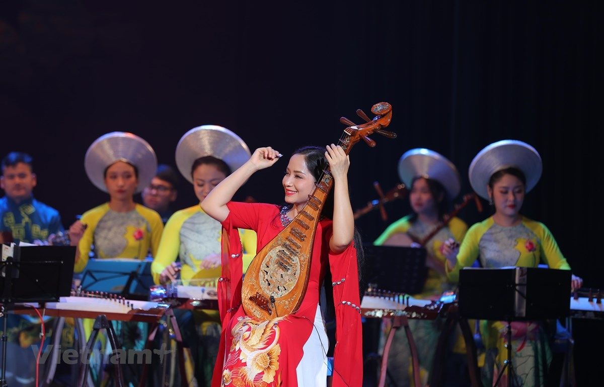 Traditional musicians from different Vietnamese regions performing with their characteristic instruments